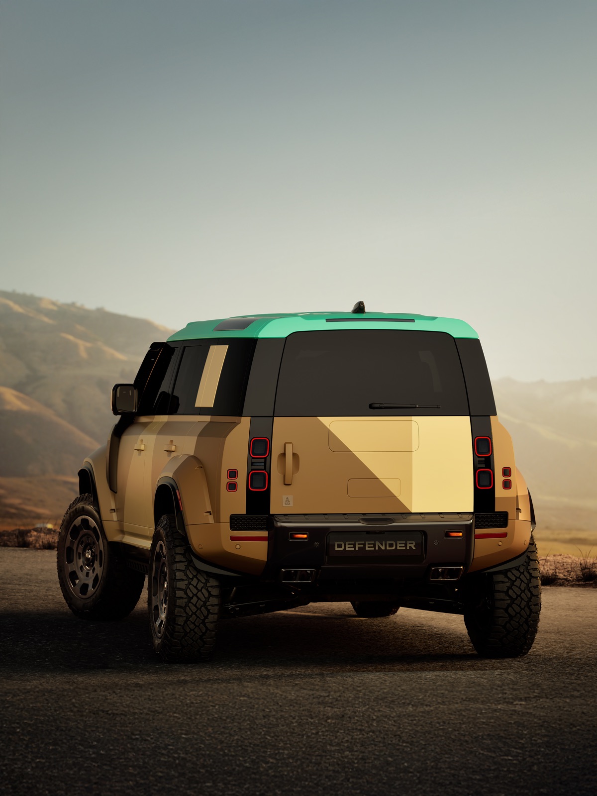 DEFENDER DAKAR のフロント斜め前方からの縦位置カット。35インチタイヤと拡張ホイールアーチ